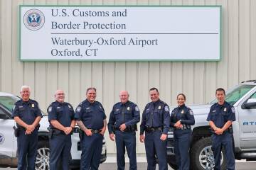 Customs and Border Protection officers outside of new CBP facility at Waterbury-Oxford Airport 