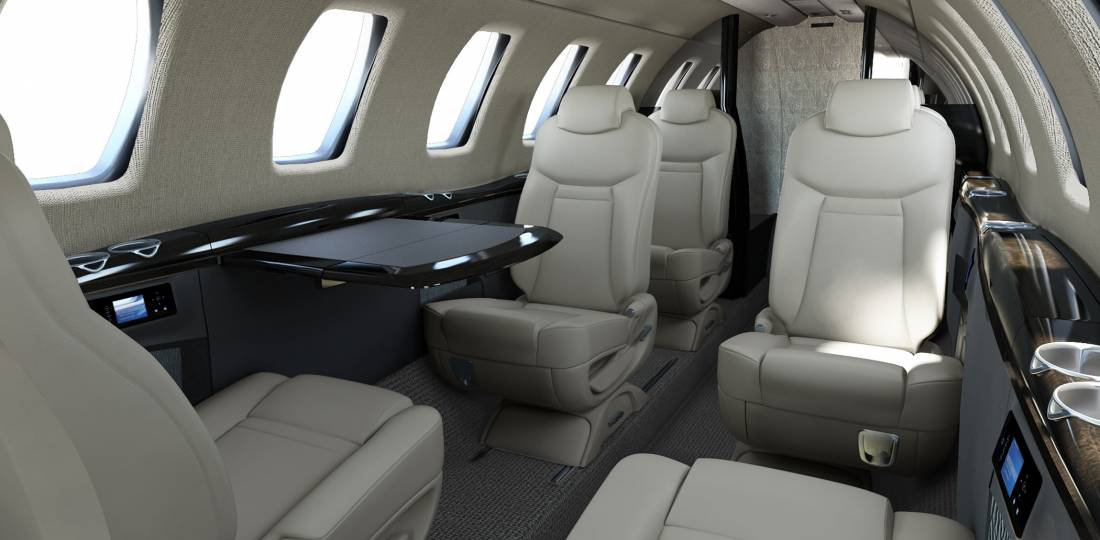  The cabin layout fits either eight or nine passenger seats, including the belted lav.