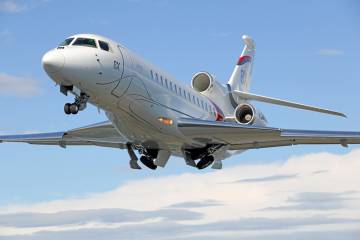 Dassault Falcon 8X putting gear up upon takeoff