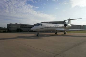 Business jet parked on the airport ramp outside the FBO now operated by Sweet Aviation at DeKalb County Airport 