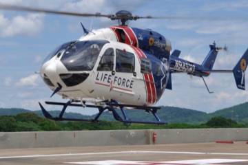 Life Force Airbus EC145e lifting off from helipad