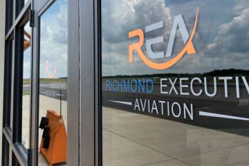 Exterior door to the FBO at Richmond Executive- Chesterfield County Airport branded with Richmond Executive Aviation logo