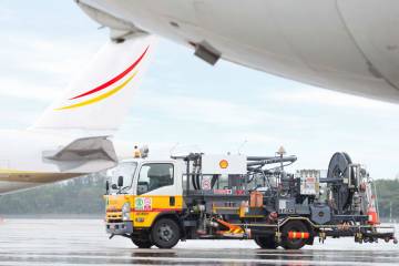 Shell refueller on the ramp alongside business jets