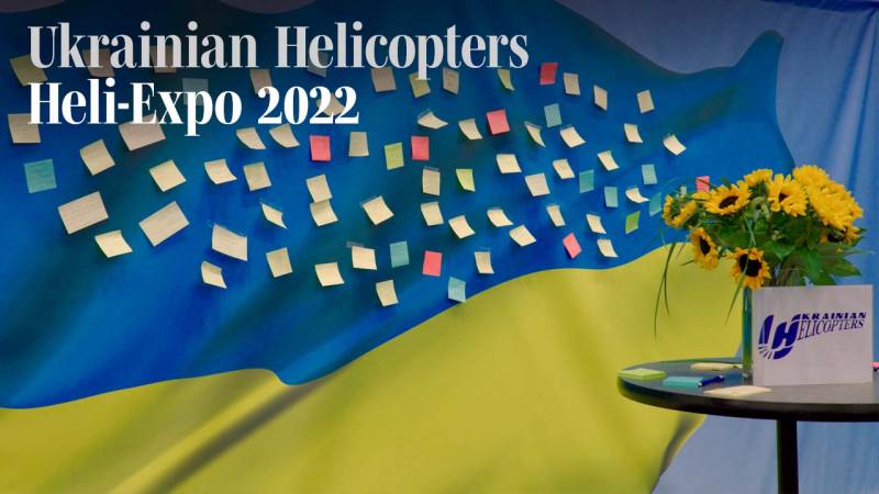 Attendees Leave Notes at Ukrainian Helicopters Booth During Heli-Expo